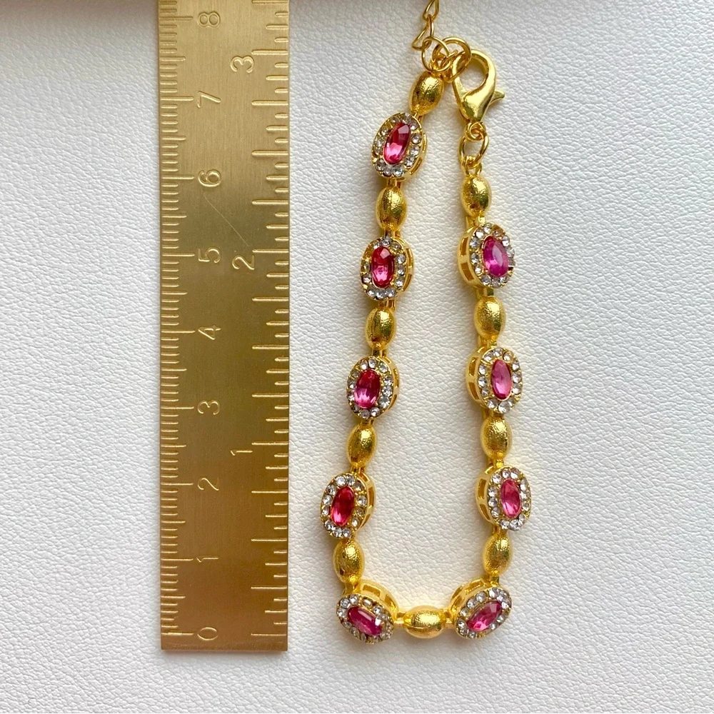 Elegant Gold and Pink Gemstone Bracelet - Picture 2 of 2